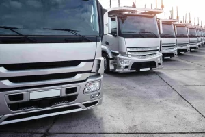 A group of truck parked in row